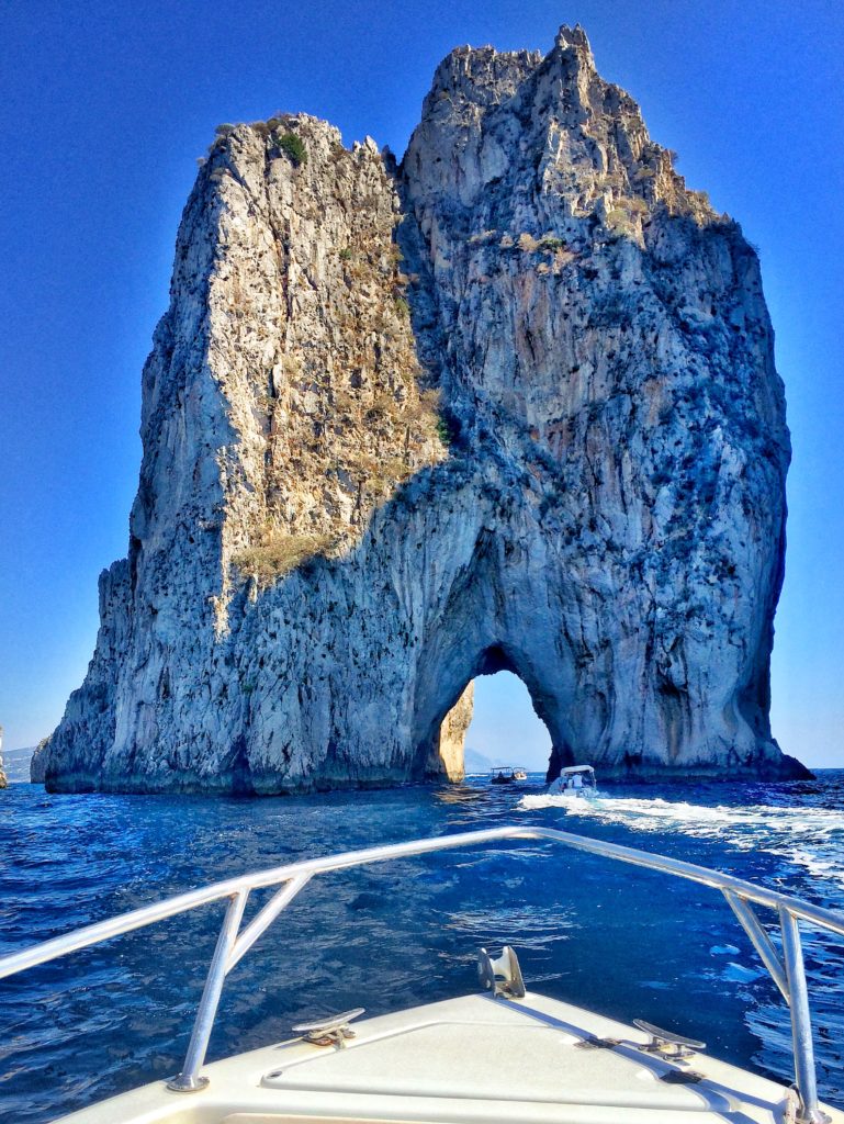 Waiting to ride through the arch at Faraglioni di Capri