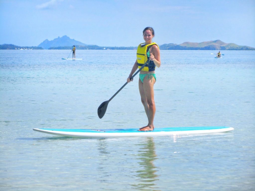 Paddle boarding at Likuliku Lagoon Resort, Fiji