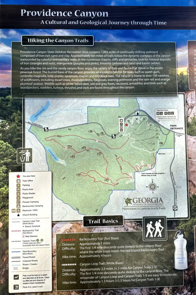 A trail map of Providence Canyon State Park in Georgia shows various trails, scenic overlooks, and picnic areas. Also known as Georgia's Little Grand Canyon