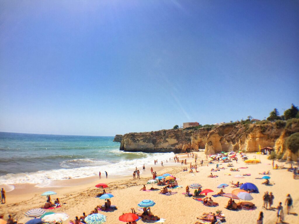 a beach at Algarve, Portugal Itinerary With Kids