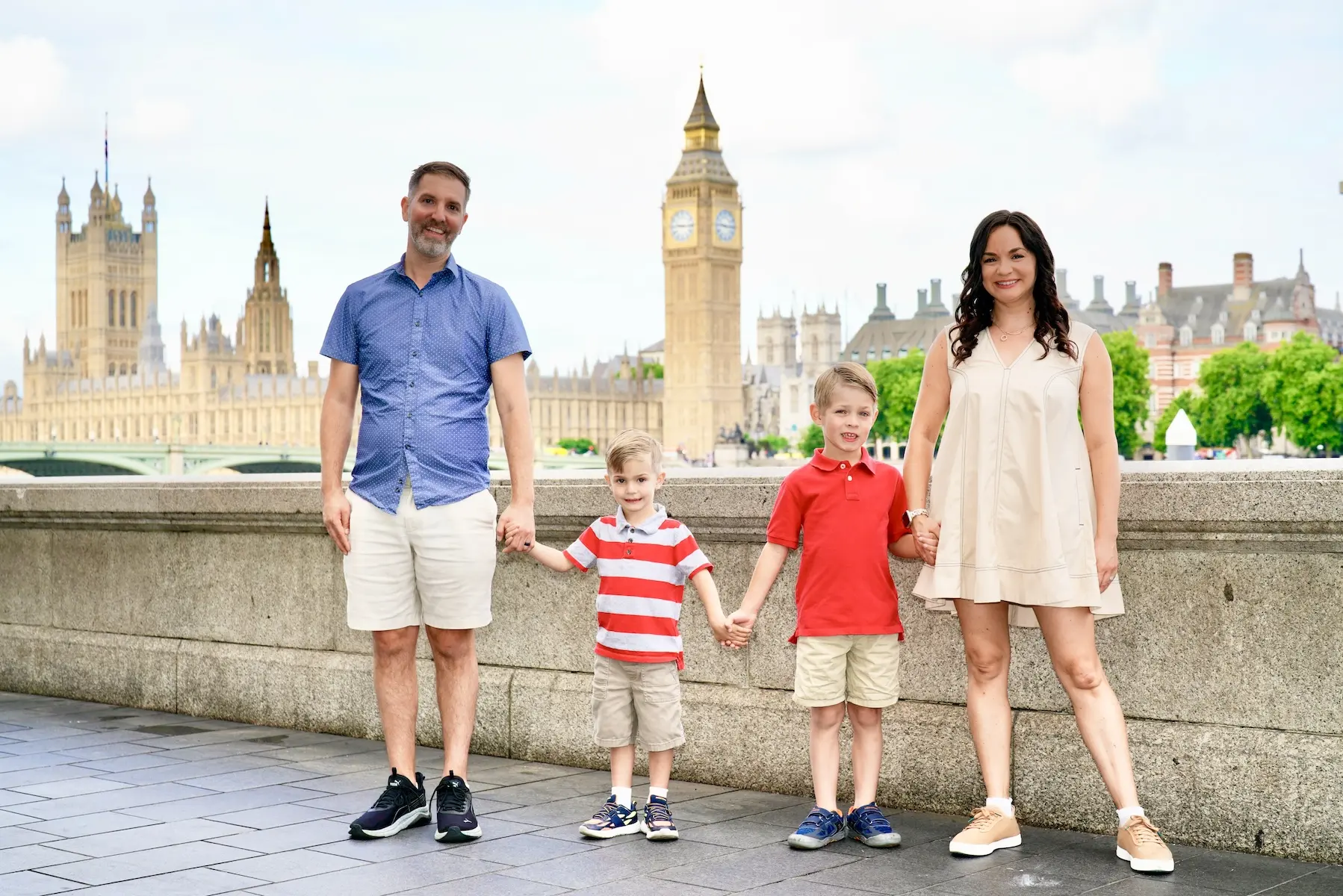 Best things to do in London with Kids - Family of four in front of Big Ben